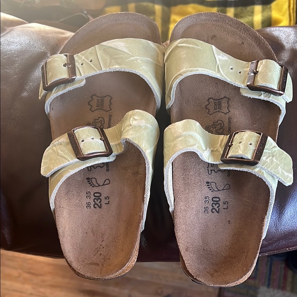 Like New Birki’s sage green crinkle leather sandals